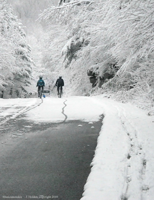 Cyclists and Snow