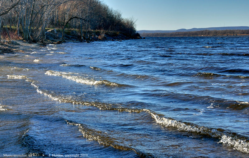 A windy Ottawa River with distant view of the Gatineau Hills